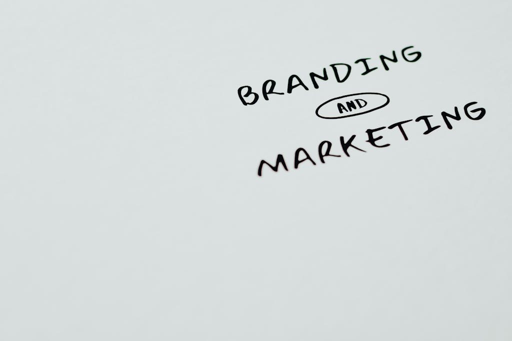 Hire Digital Advertising Agency Near Me - A minimalist image featuring the words 'Branding' and 'Marketing' on a white background, ideal for digital marketing themes.